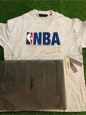 Essentials NBA Logo Crewneck T-Shirt in Heather Gray with Blue & Red Accents